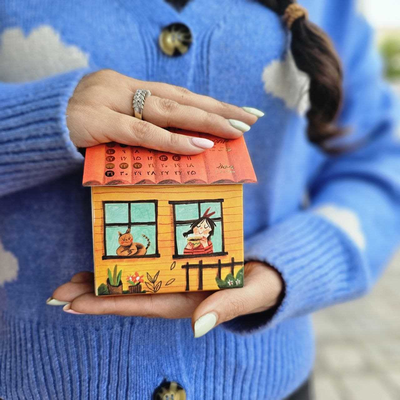 تقویم رو‌میزی 1403 طرح کلبه